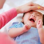 Penyebab Umum Bayi Demam dan Cara Mengatasinya